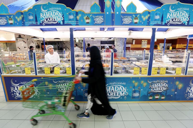 Abu Dhabi, United Arab Emirates - May 05, 2019: People shopping for Ramadan. Sunday the 5th of May 2019. Al Wahda Mall, Abu Dhabi. Chris Whiteoak / The National