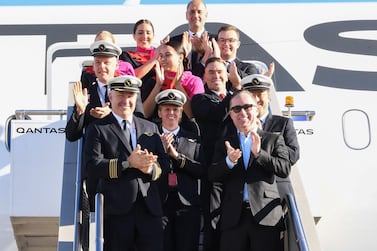 In this handout photo from Qantas shows Qantas Group CEO Alan Joyce (Bottom-R) and crew exiting a Qantas Boeing 787 Dreamliner plane after arriving at Sydney international airport after completing a non-stop test flight from New York to Sydney on October 20, 2019. The Qantas Boeing 787 completed the flight, non-stop New York to Sydney in 19 hours and 15 minutes. - --EDITORS NOTE -- RESTRICTED TO EDITORIAL USE MANDATORY CREDIT " AFP PHOTO / QANTAS " NO MARKETING NO ADVERTISING CAMPAIGNS - DISTRIBUTED AS A SERVICE TO CLIENTS - NO ARCHIVES / AFP / QANTAS / DAVID GRAY / --EDITORS NOTE -- RESTRICTED TO EDITORIAL USE MANDATORY CREDIT " AFP PHOTO / QANTAS " NO MARKETING NO ADVERTISING CAMPAIGNS - DISTRIBUTED AS A SERVICE TO CLIENTS - NO ARCHIVES
