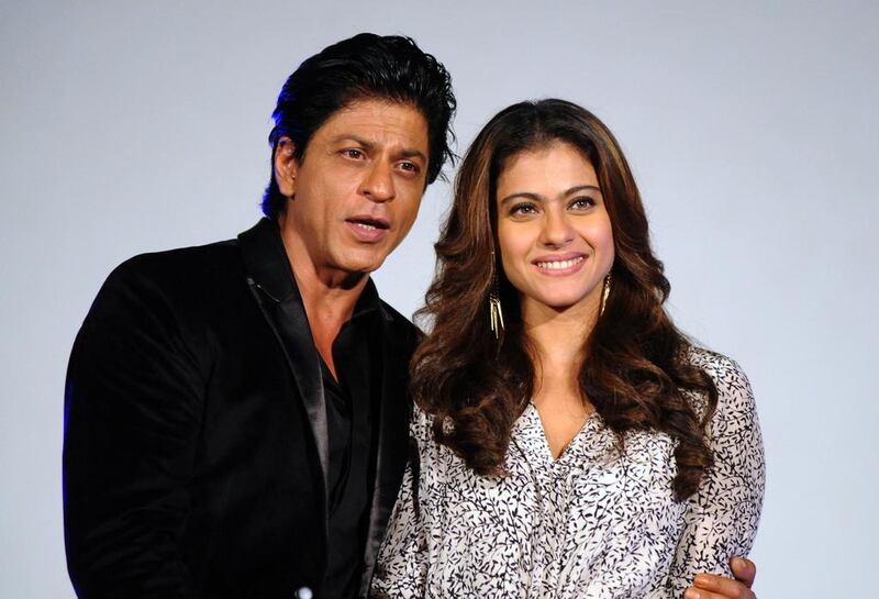 Shah Rukh Khan and Kajol head a line-up of stars who will walk the red carpet at Diff. AFP PHOTO / AFP / STR