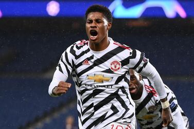 Manchester United's English Forward Marcus Rashford celebrates after scoring a goal during the UEFA Europa League Group H first-leg football match between Paris Saint-Germain (PSG) and Manchester United at the Parc des Princes stadium in Paris on October 20, 2020. / AFP / FRANCK FIFE