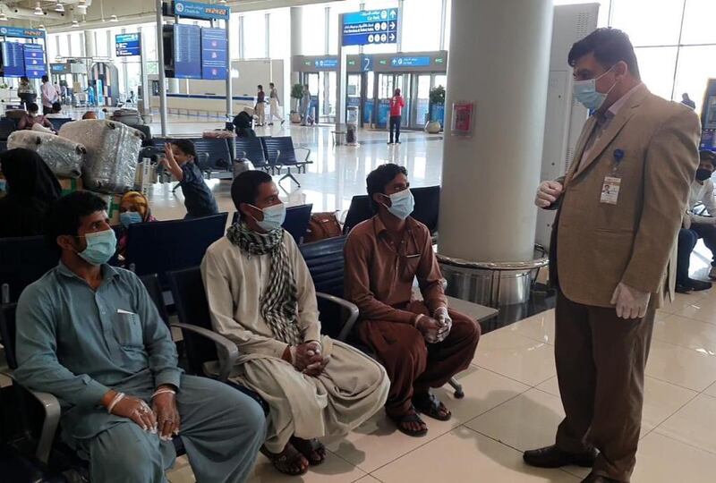 Pakistani citizens wait to board their flight to Islamabad from Dubai on Saturday evening. Courtesy: Consulate General of Pakistan in Dubai 