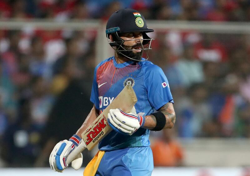 India's captain Virat Kohli leaves the field after being dismissed for 19 during the second Twenty20 international against the West Indies. AP