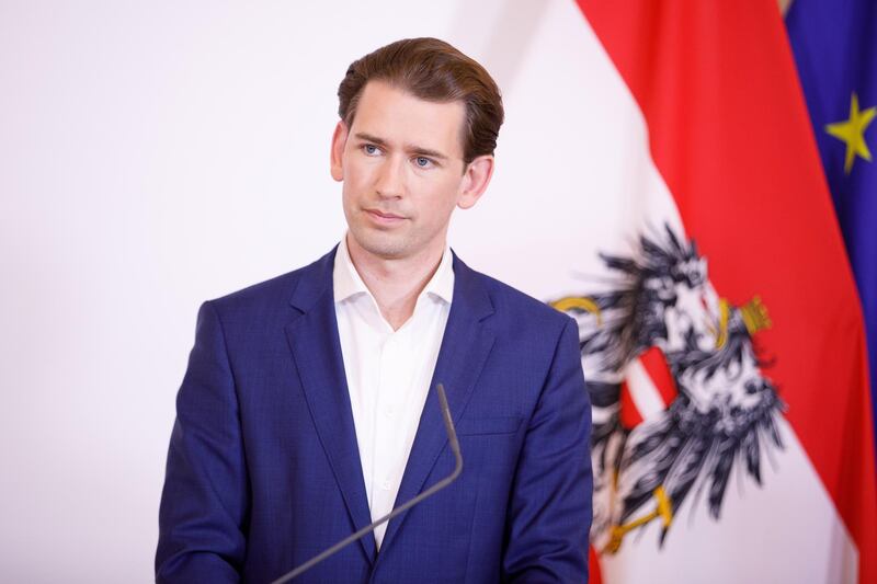 epa08536974 Austrian Chancellor Sebastian Kurz speaks during a press conference with  Austrian Interior Minister Karl Nehammer, Austrian Vice-Chancellor Werner Kogler and Austrian Minister for Social Affairs, Health, Care and Consumer Protection, Rudolf Anschober at the Austrian Chancellery in Vienna, Austria, 09 July 2020. Austrian government introduces corona traffic light system (green, yellow, red) for every district in Austria.  EPA/FLORIAN WIESER