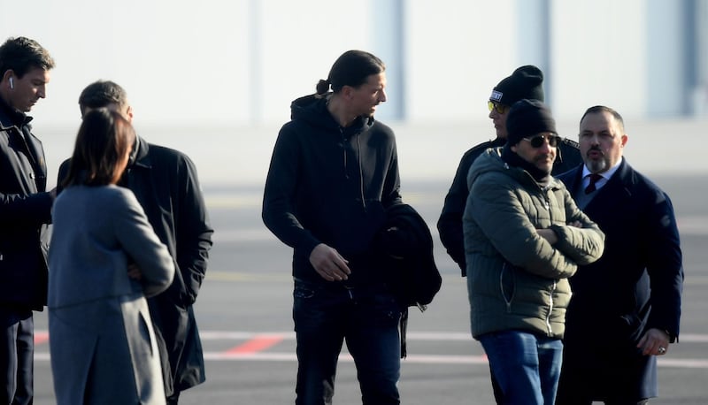 Zlatan Ibrahimovic arrives at the airport. AFP