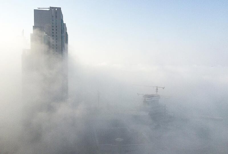 Early morning fog in Abu Dhabi. (Rob Gurdebeke / The National) 