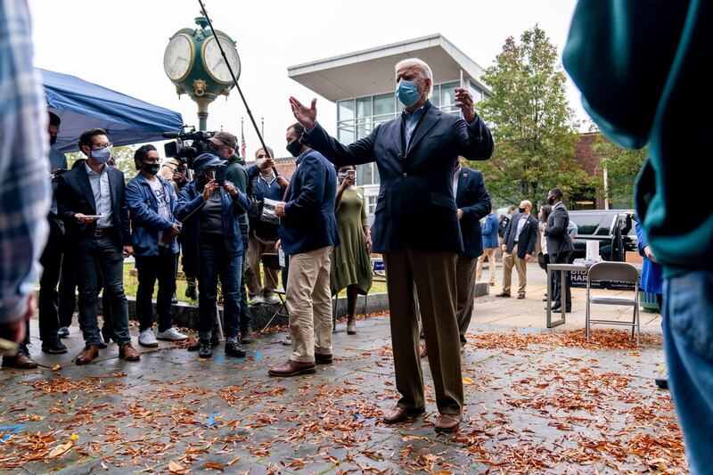 Democratic presidential candidate former Vice President Joe Biden speaks with supporters outside a voter service center, in Chester, Pennsylvania. AP Photo