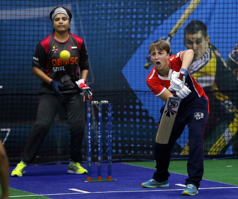 England's Sarah Fogwill plays a shot against UAE during one of the opening matches on the first day of the Indoor Cricket World Cup, Saturday, Sept. 16, 2017, in Dubai, United Arab Emirates. (AP Photo/Kamran Jebreili)