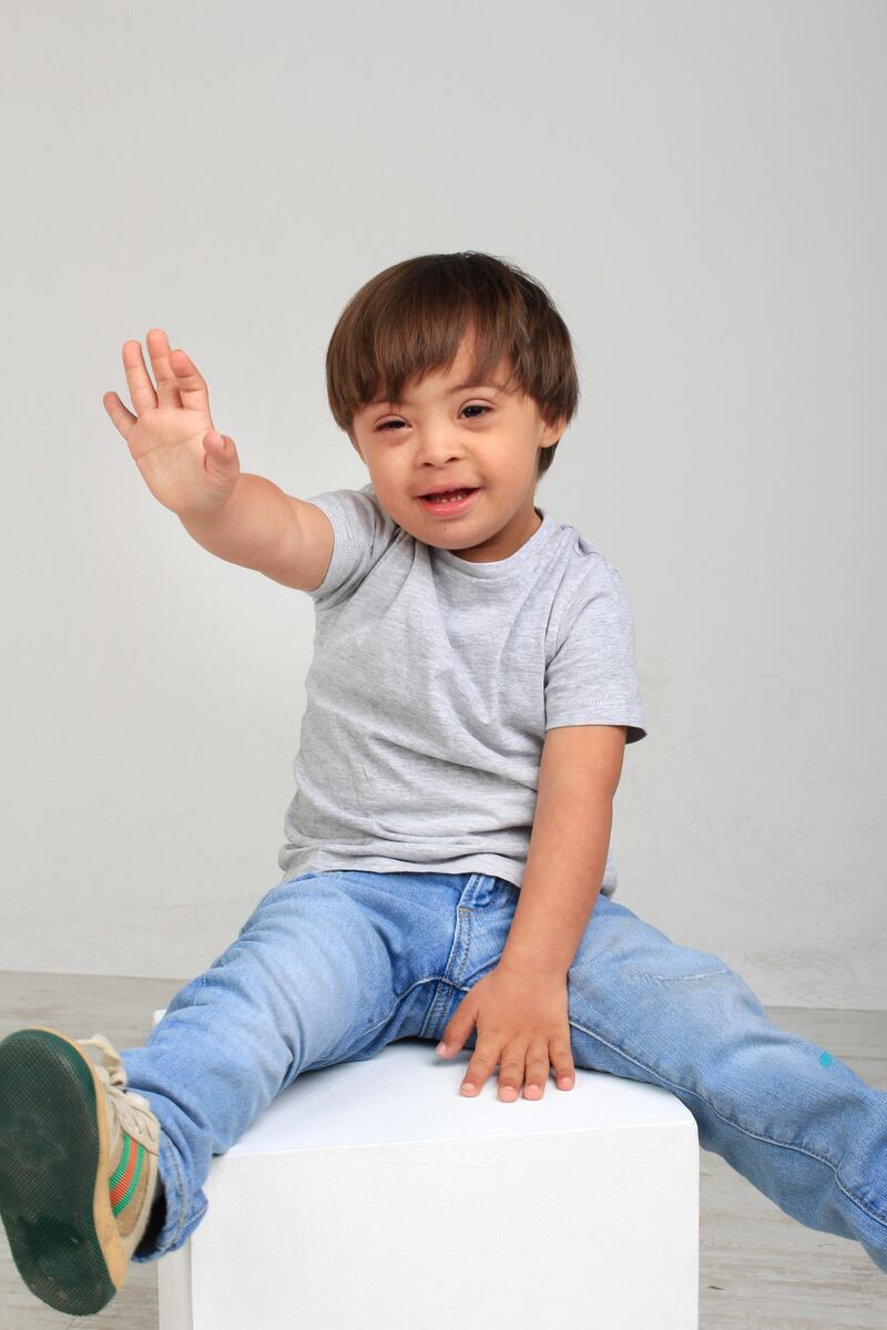 Three-year-old Emilio Said waves for the camera, as part of Bareface's new initiative. Courtesy Carl Vincent