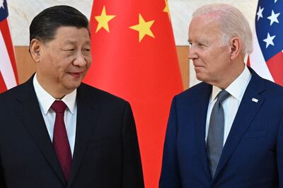 US President Joe Biden (R) and China's President Xi Jinping meet on the sidelines of the G20 Summit in Bali, on November 14, 2022. AFP
