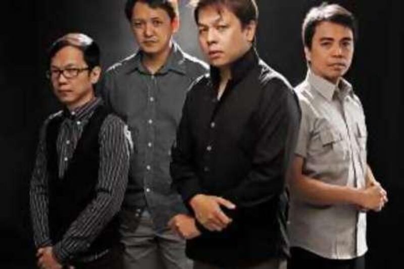 Jett Pangan, front right, with his band, The Dawn.