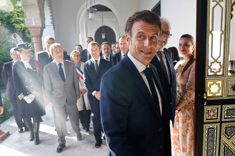 French President Emmanuel Macron arrives for a centenary event at the Grand Mosque in Paris. AP