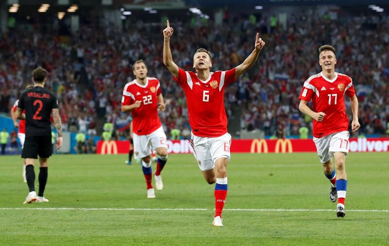 Russia's Denis Cheryshev celebrates scoring their first goal. Maxim Shemetov/Reuters
