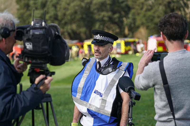 An incident commander with Cornwall Police speaks to reporters. Getty Images