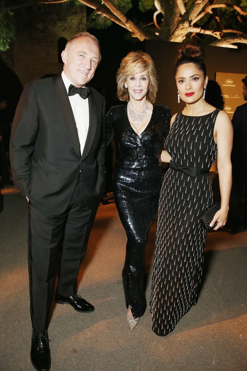 CANNES, FRANCE - MAY 17:  L-R Francois-Henri Pinault, Jane Fonda and Salma Hayek attend the Kering Official Cannes Dinner at Place de la Castre on May 17, 2015 in Cannes, France. (Photo by Andreas Rentz/Getty Images)