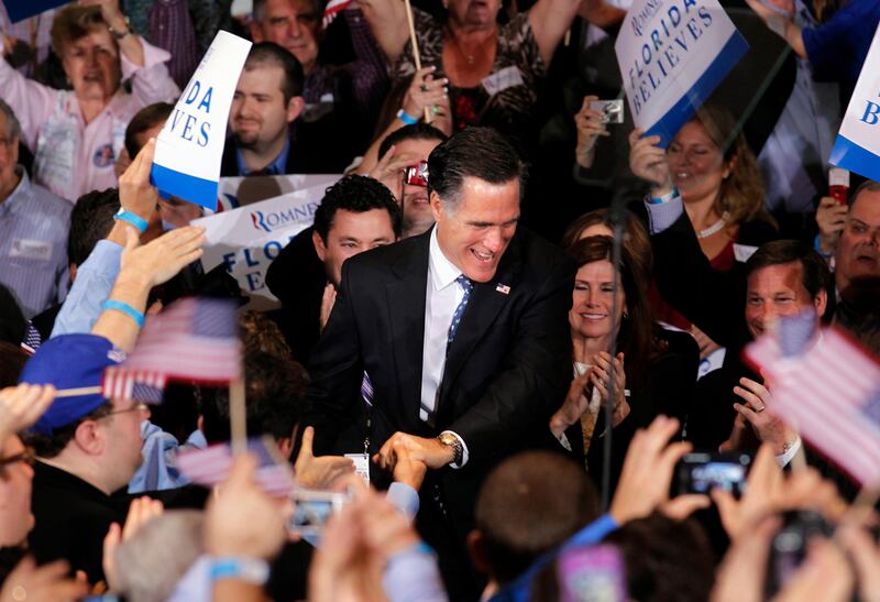 Republican presidential candidate, former Massachusetts Gov. Mitt Romney, greets supporters at his Florida primary primary night rally in Tampa, Fla., Tuesday, Jan. 31, 2012. (AP Photo/Gerald Herbert) *** Local Caption ***  APTOPIX Romney 2012.JPEG-09cda.jpg