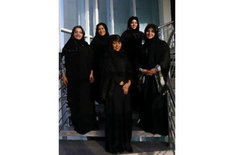 From left, Jamila Al Suweidi, Ghada Al Amiri, Meytha Al Mutawaa, Amna Ali Abdullah and Ohood Omar Abdullah at the Dubai Outlet Management Office. Satish Kumar / The National