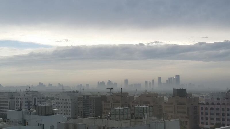 Rain clouds hover over central Abu Dhabi. Aaron Gray / The National