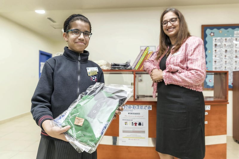DUBAI, UNITED ARAB EMIRATES.  JANUARY 2018. Mishal Faraz (11 India), a grade six student at the Winchester School Jebel Ali who is encouraging families to donate gently used uniforms and books to be reused by children in need of them. Her principal, Meenakshi Dahiya, helped her set up two cupboards/lockers in the school where kids can donate (or take) used books and uniforms. (Photo: Antonie Robertson/The National) Journalist: Roberta Pennington. Section: National.