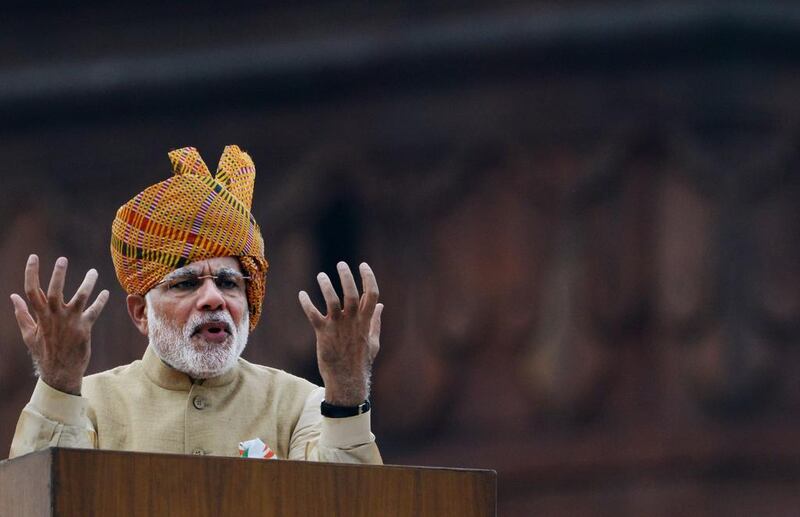 Indian prime minister Narendra Modi gestures as he delivers his independence day speech from The Red Fort in New Delhi on August 15, 2015. Roberto Schmidt/AFP Photo

