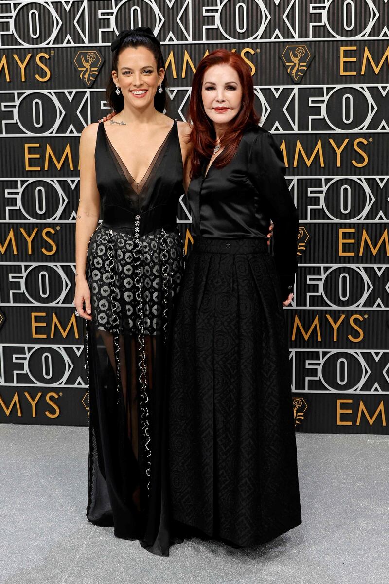 Riley Keough, wearing Chanel, with Priscilla Presley. Getty Images 