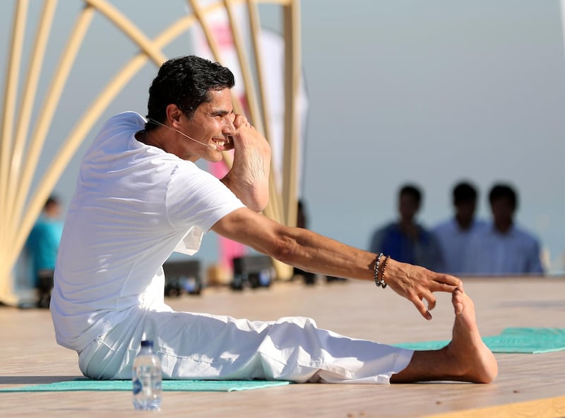 Dubai, United Arab Emirates - March 16th, 2018: Yogi Cameron. A mass yoga session hosted by Bollywood actress Malaika Arora as part of X Yoga Dubai. Friday, March 16th, 2018. Kite Beach, Dubai. Chris Whiteoak / The National