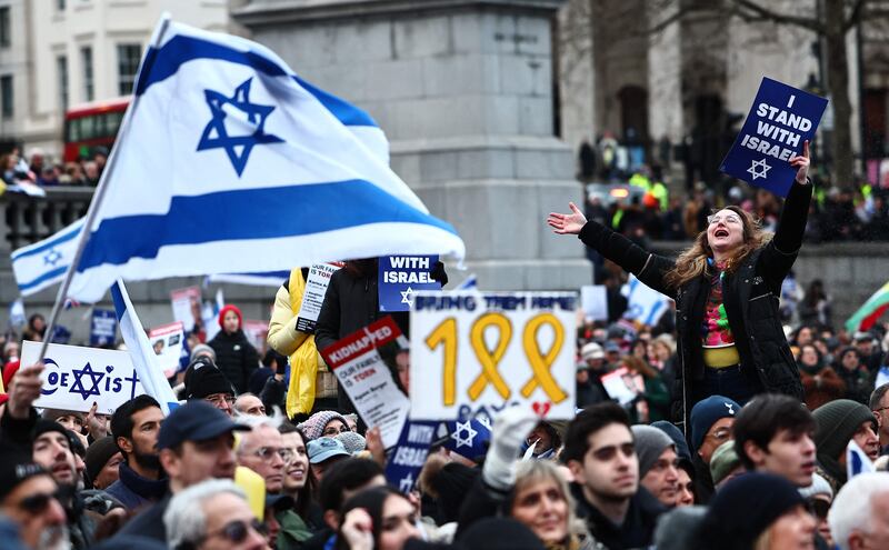 Pro-Israeli supporters hold placards as they gather for a demonstration in Trafalgar Square in central London. AFP