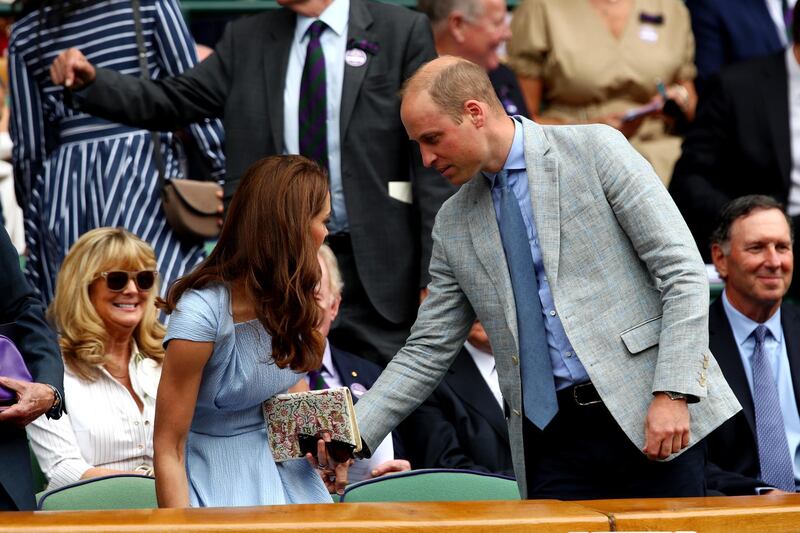 Britain's Catherine, Duchess of Cambridge, and Britain's Prince William, the Duke of Cambridge, in the Royal Box ahead of the final between Switzerland's Roger Federer and Serbia's Novak Djokovic. Clive Brunskill/Getty Images