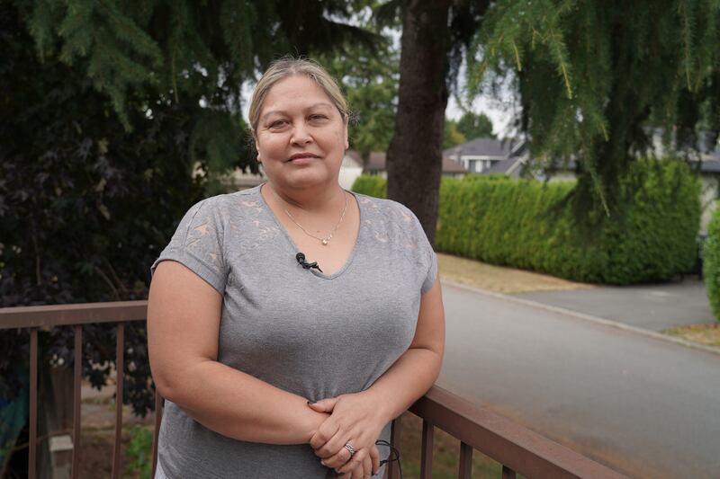 Angela White, the executive director of the Indian Residential Schools Survivors Society poses outside her home near Vancouver, Canada. Willy Lowry / The National