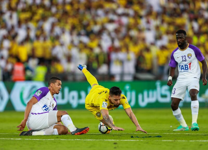 Abu Dhabi, UAE.  May 3, 2018.   President's Cup Final, Al Ain FC VS. Al Wasl.  (center) Ronaldo Mendes gets tripped as he tries to get away with the ball.
Victor Besa / The National
Sports
Reporter: John McAuley