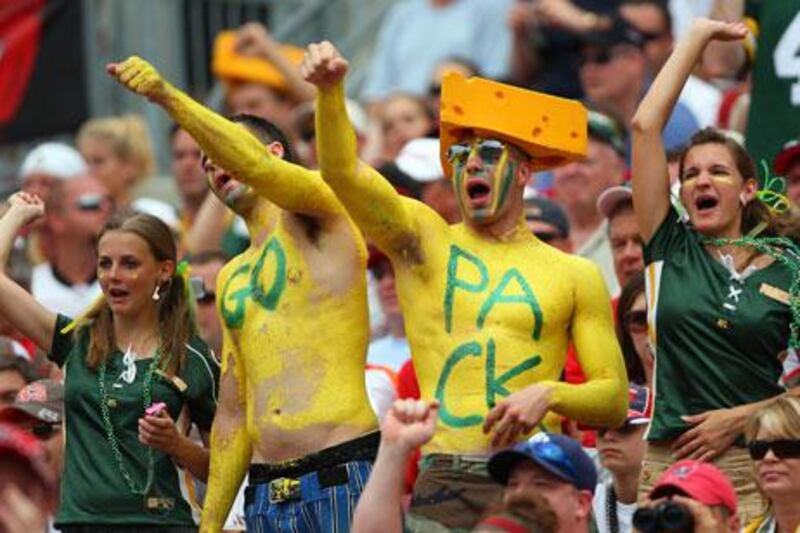 With painted faces, bodies and a cheesehead hat or two, Green Bay Packer fans always get dressed up for a game, regardless of the weather.