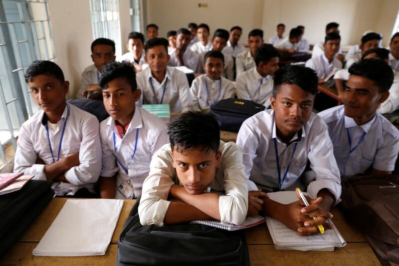 Rohingya students are seen during a class at school, at Leda refugee camp in Cox’s Bazar, Bangladesh, February 9, 2019. Picture taken February 9, 2019. REUTERS/Jiraporn Kuhakan