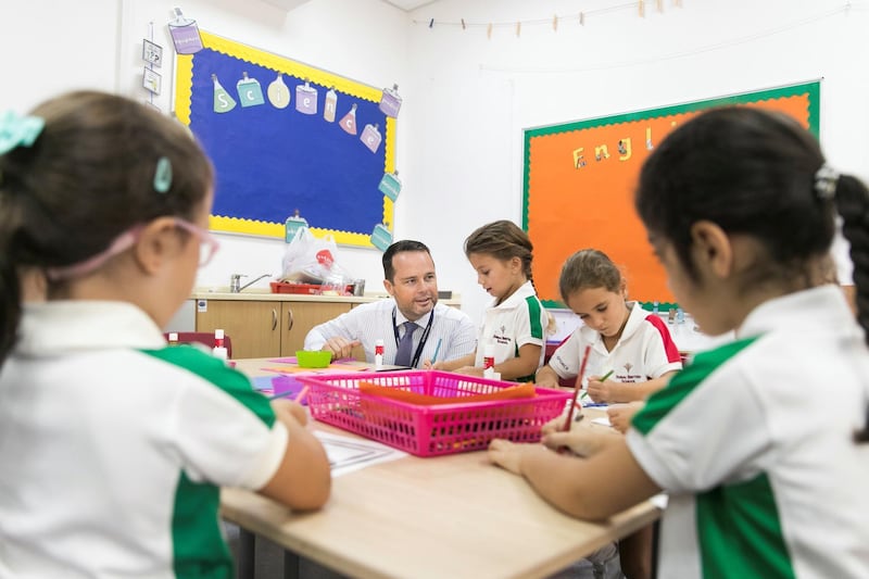 DUBAI, UNITED ARAB EMIRATES - SDEPTEMBER 2, 2018. 
Brendan Fulton, Principal at Dubai British School, interacts with year 1 students on their first day of school.

(Photo by Reem Mohammed/The National)

Reporter: Ramola TalwarSection:  NA