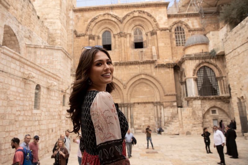 Meza wore a flowing, full-length dress with flat sandals as she toured the Old City. AP