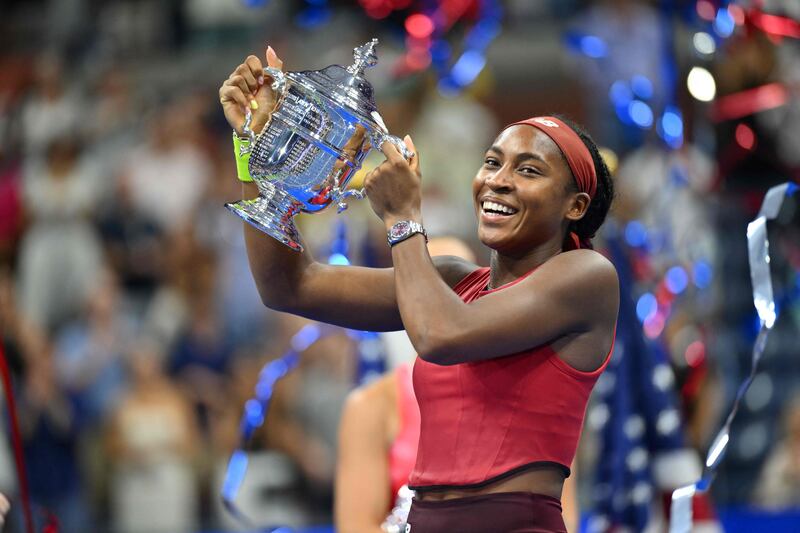 USA's Coco Gauff poses with the trophy after defeating Belarus's Aryna Sabalenka in the US Open tennis tournament women's singles final match at the USTA Billie Jean King National Tennis Center in New York. AFP