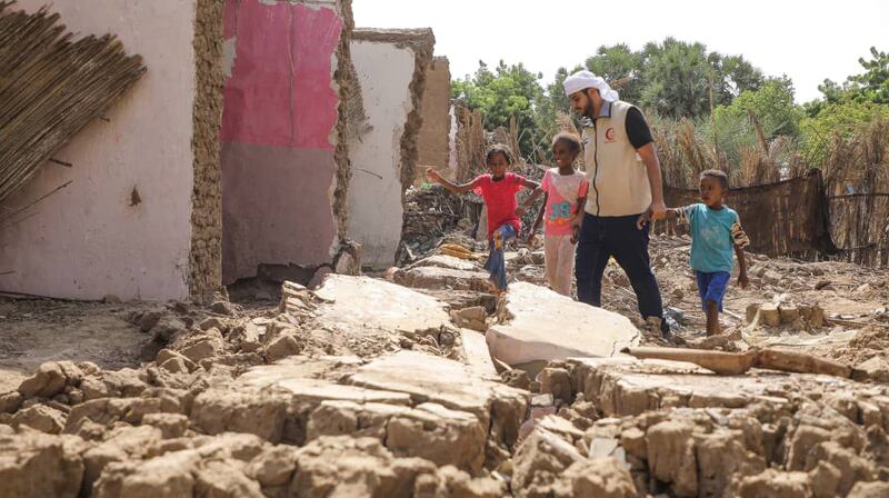 Emirates Red Crescent workers have taken the aid to remote villages in the country hit by flooding. Wam