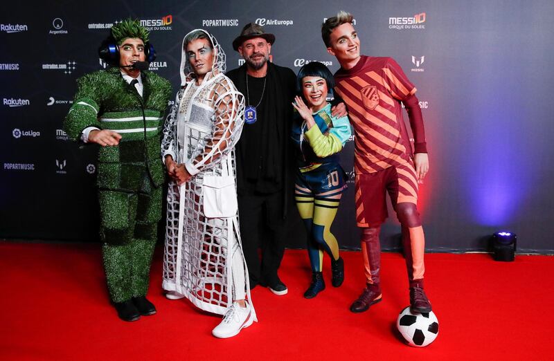 Cirque du Soleil's founder Guy Laliberte and artists pose during the premiere of the "Messi10" show. Reuters