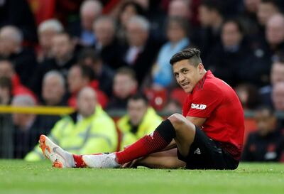 FILE PHOTO: Soccer Football - Premier League - Manchester United v Southampton - Old Trafford, Manchester, Britain - March 2, 2019  Manchester United's Alexis Sanchez reacts after sustaining an injury          Action Images via Reuters/Carl Recine  EDITORIAL USE ONLY. No use with unauthorized audio, video, data, fixture lists, club/league logos or "live" services. Online in-match use limited to 75 images, no video emulation. No use in betting, games or single club/league/player publications.  Please contact your account representative for further details./File Photo