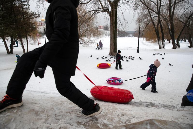 Children enjoy sledding in a park in Moscow, Russia. AP Photo