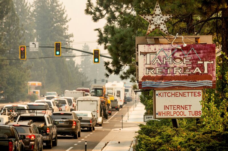 With the Caldor Fire approaching, traffic on Highway 50 stands still as South Lake Tahoe, Calif. , as residents try to evacuate on Monday, Aug.  30, 2021.  (AP Photo / Noah Berger)