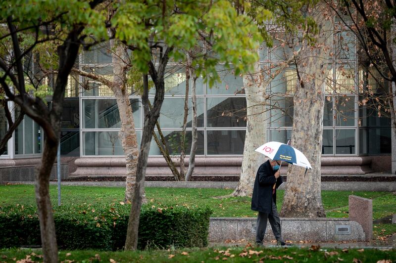 Rain begins to fall near the Van Nuys court in southern California, on Tuesday. AP