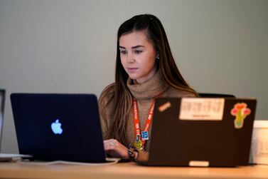 US teachers like Cristin Espinoza from RISE school in Denver have been working remotely, but many are being called back into the classroom. AP