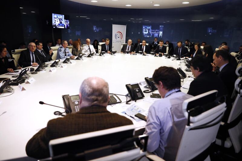 French President Emmanuel Macron presides over an emergency crisis meeting at the Interior Ministry in Paris. EPA