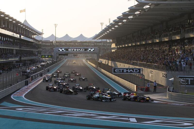 Sebastian Vettel of Red Bull leads the first lap of the Etihad Airways Abu Dhabi Grand Prix on November 3. Yas Marina Circuit could see twice as much drama when the track hosts the Formula One season finale next year as the race will offer double points. Christopher Pike / The National