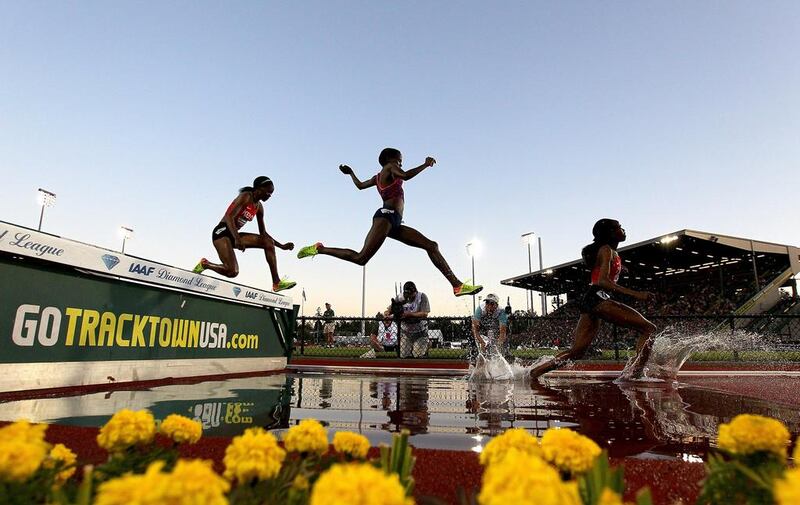 Celliphine Chepteek Chespol of Ethiopia jumps in the water pit during the 3000m Steeplechase during the 2017 Prefontaine Classic Diamond Leagueat Hayward Field in Eugene, Oregon. Jonathan Ferrey / Getty Images / AFP