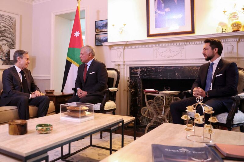 A handout picture released by the Jordanian Royal Palace shows Jordan's King Abdullah II (C) and and Crown Prince Hussein meeting with US Secretary of State Antony Blinken in Washington, DC, on February 2, 2023.  (Photo by Jordanian Royal Palace  /  AFP)  /  RESTRICTED TO EDITORIAL USE - MANDATORY CREDIT "AFP PHOTO  /  JORDANIAN ROYAL PALACE" - NO MARKETING NO ADVERTISING CAMPAIGNS - DISTRIBUTED AS A SERVICE TO CLIENTS