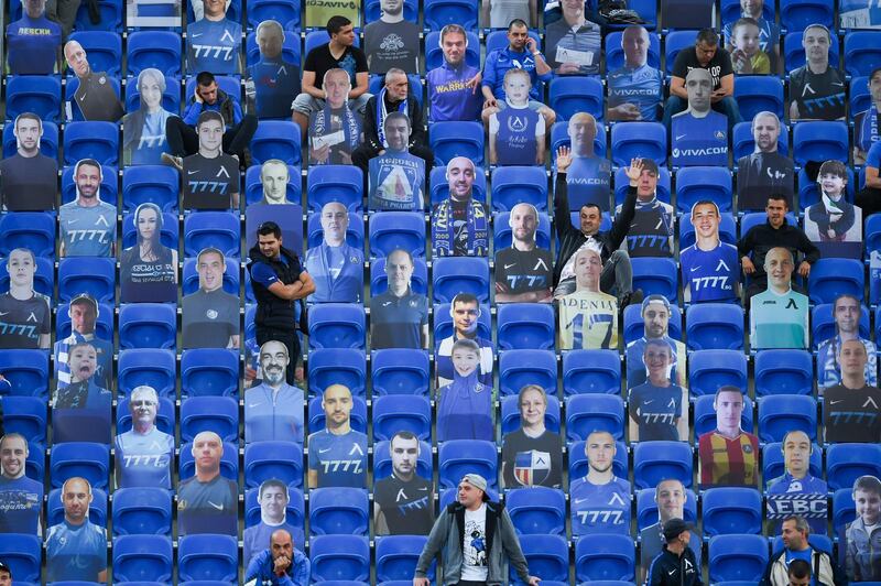 Supporters of Levski Sofia, surrounded by cartboard, wait for the start of a football match between Levski Sofia and Ludogorets Razgrad in Sofia, Bulgaria. AFP
