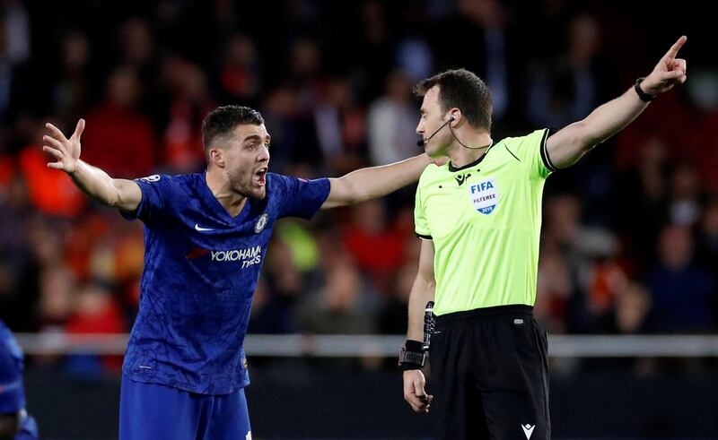 Chelsea's Mateo Kovacic argues with referee Felix Zwayer. Reuters