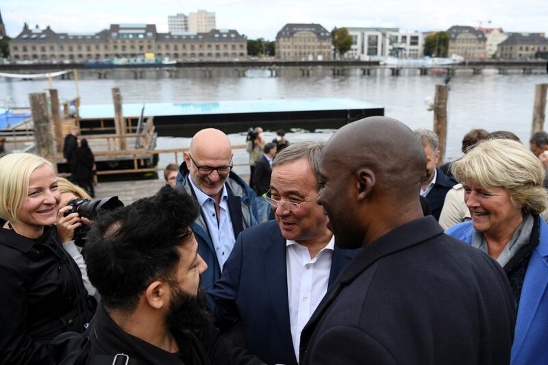 Armin Laschet talks to people during a Christian Democratic Union event in Berlin. Photo: Reuters