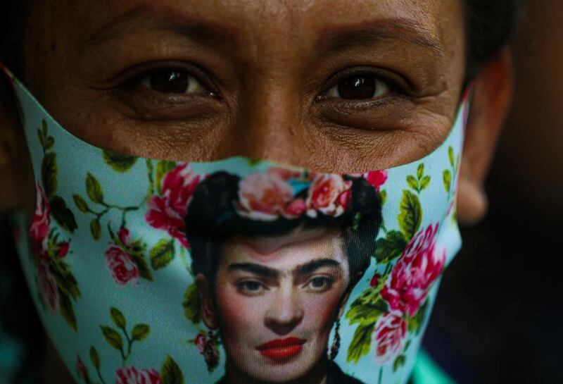 An artisan attends a protest blocking Paseo de la Reforma avenue in Mexico City. Artisan families originally from Oaxaca are asking for financial help, months after the city government closed their market as part of the lockdown to curb the spread of Covid-19. AP Photo
