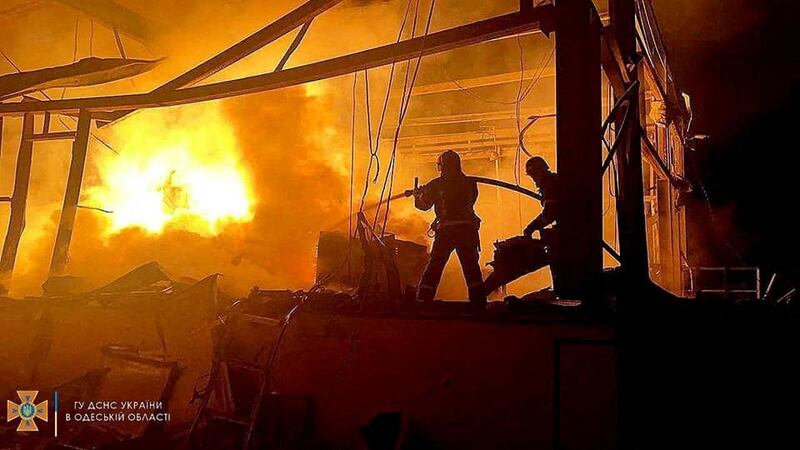 First responders work at the site of a missile strike in Odesa, in an image released by Ukraine's emergency services. Reuters